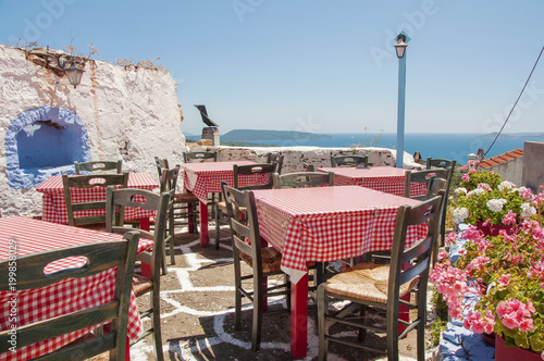 Traditional Greek taverna at the old village Alonissos at Alonissos island in Greece