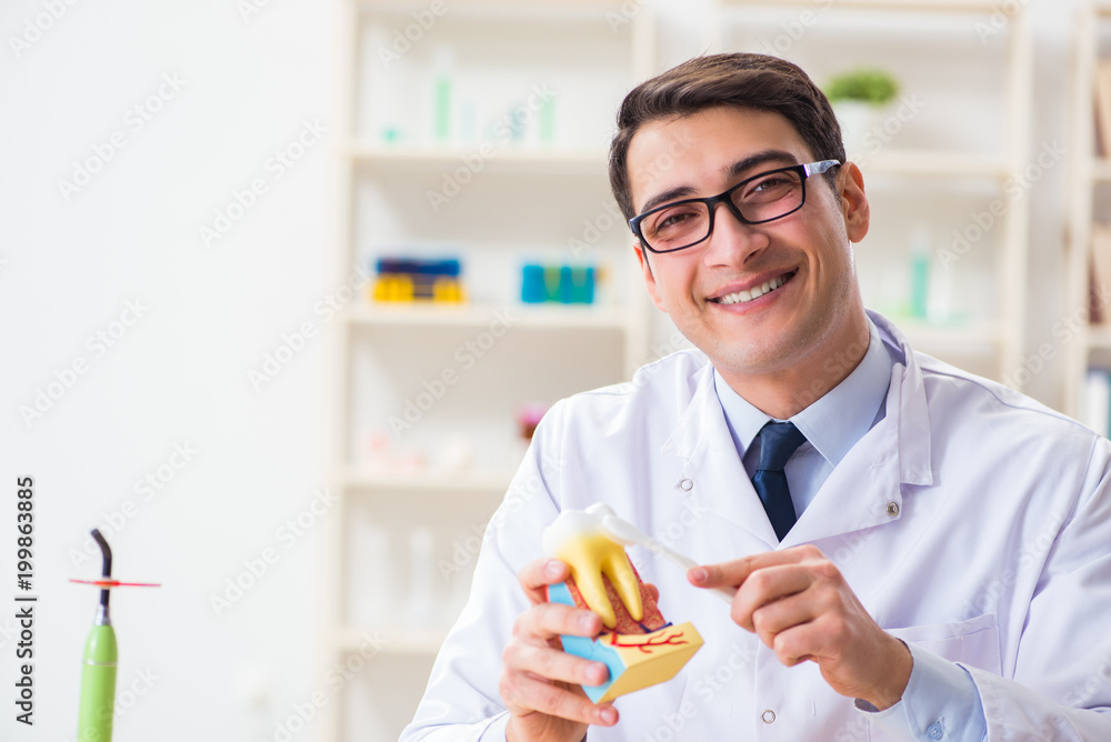 Young dentist working in the dentistry hospital Young dentist working in the dentistry hospital