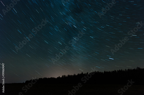 Super long exposure picture of moving stars over the sky