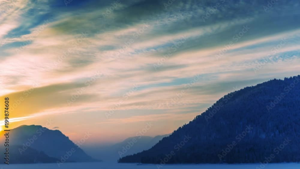 Sunrise Time Lapse at Winter Mountain Lake. Altai, Siberia. Sunrise Time Lapse at Winter Mountain Lake. Altai, Siberia.