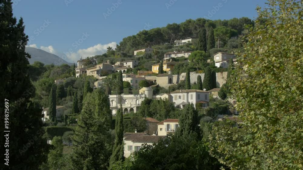 Houses on a forested hill Houses on a forested hill