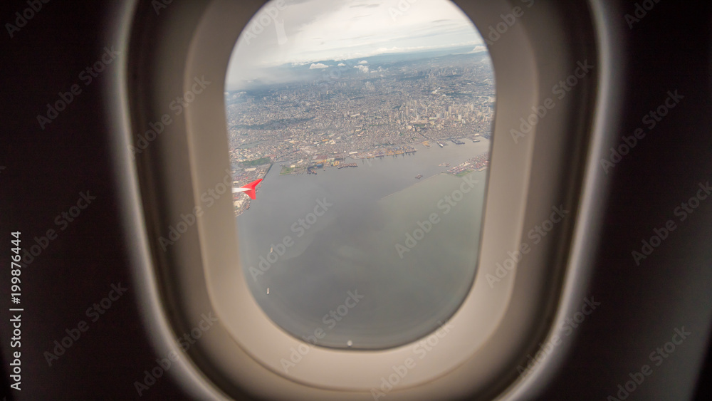 View from the window of the plane to the city of Manila. Philippines. View from the window of the plane to the city of Manila. Philippines.