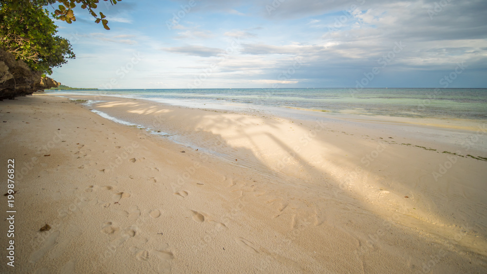 Beautiful gentle nature of the Philippines. The island of Bohol. A beach with sloping cliffs. Anda. Poblacion village. Beautiful gentle nature of the Philippines. The island of Bohol. A beach with sloping cliffs. Anda. Poblacion village.