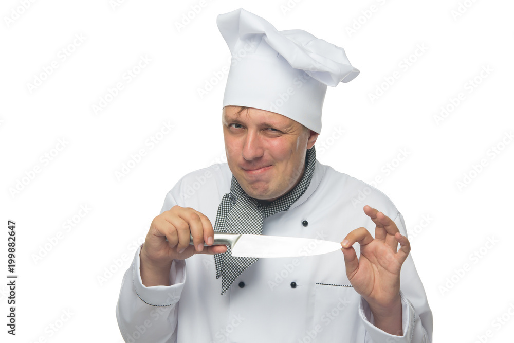 cunning cook, on a white background, holds a knife in his hand