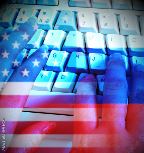 Programmer Typing And Russia Usa Flags Showing Hacking