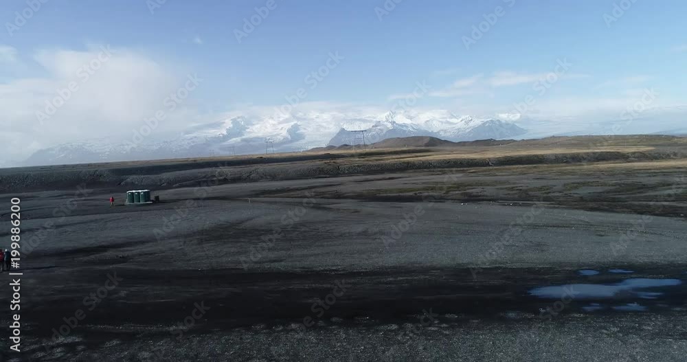 The black sand beach in Iceland. Aerial view and top view. Beautiful natural backdrop. The black sand beach in Iceland. Aerial view and top view. Beautiful natural backdrop.