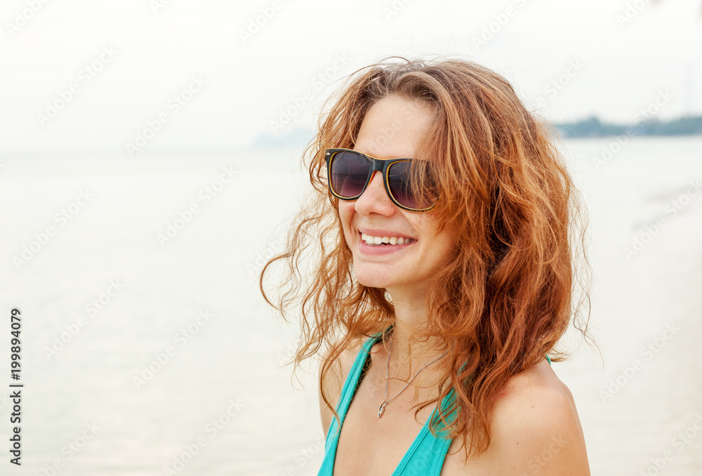 Portrait of a beautiful young funny woman girl in sunglasses Portrait of a beautiful young funny woman girl in sunglasses