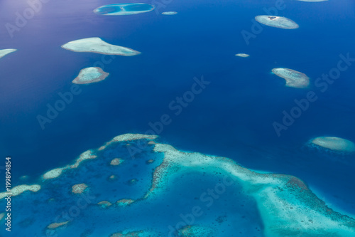 Aerial view of Maldives atolls is the world top beauty. Maldives tourism.