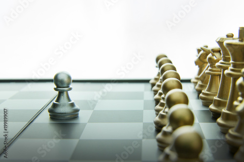 gold and silver chess on board close up image abstract Background.