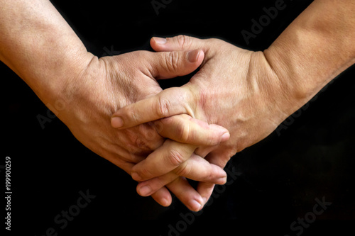 Canvas Print Crossed fingers of hands