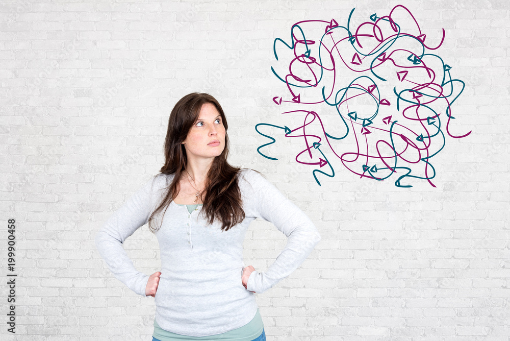 Pensive woman being confused and looking for a solution shown by chaotic arrows around head Pensive woman being confused and looking for a solution shown by chaotic arrows around head