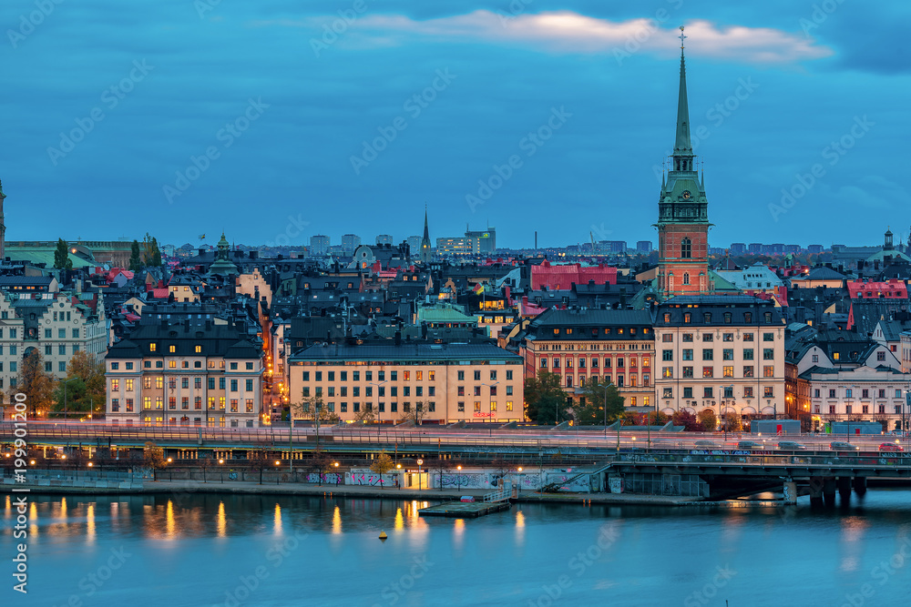 Obraz premium Sunset view onto Stockholm old town Gamla Stan and German church in Sweden