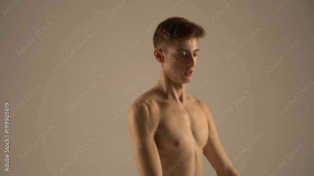 Young male balerun shows the basic ballet poses Efface Young male balerun shows the basic ballet poses Efface