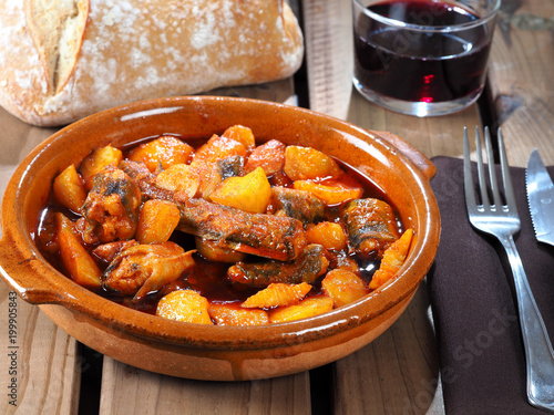 All i Pebre de Anguila – European Eel with garlic and paprika

Traditional Valencian dish, stew with european eel, potatoes, garlic, and paprika. photo