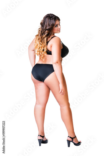 Plus size sexy model in black underwear, fat woman isolated on white background, overweight female body