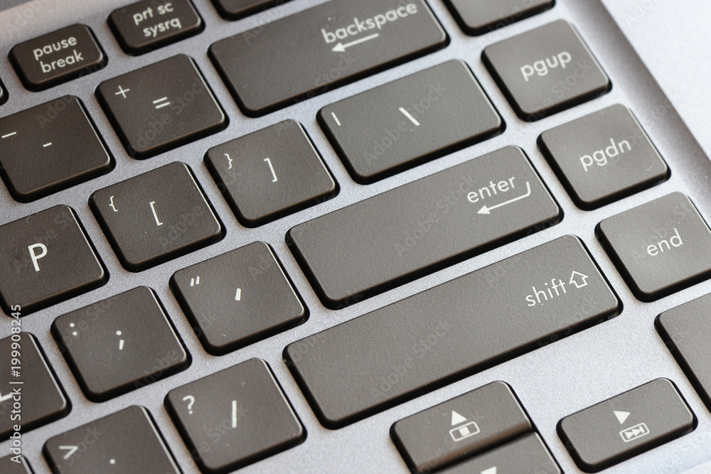 Closeup of laptop keyboard buttons with symbols Closeup of laptop keyboard buttons with symbols