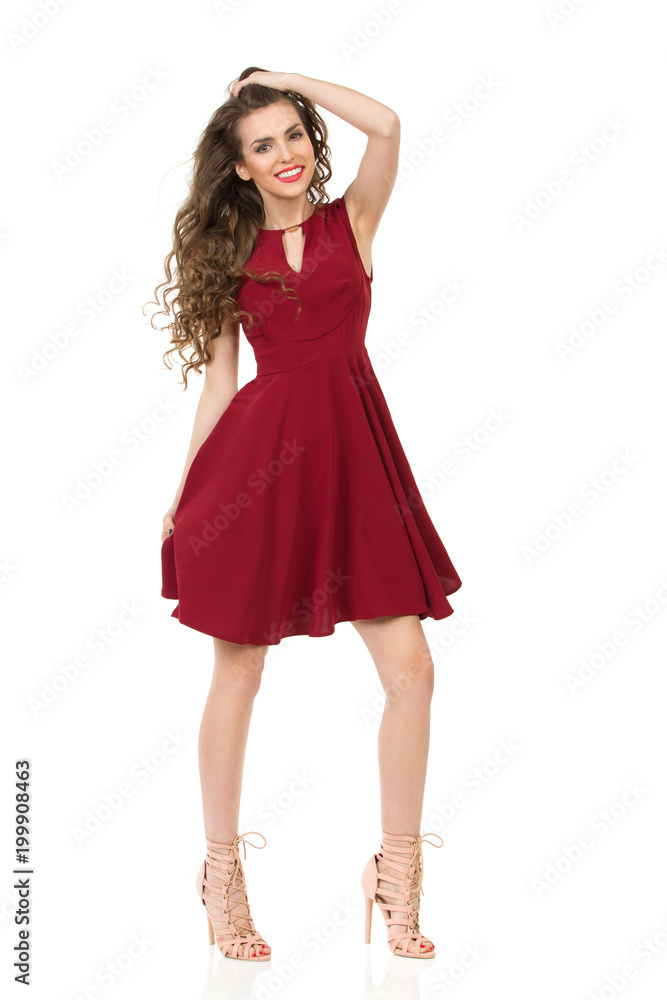 Smiling Young Woman In Elegant Burgundy Dress And High Heels