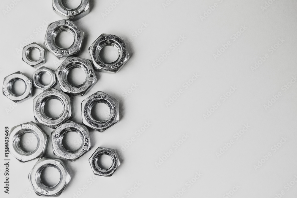 Nuts and bults metallic with white background Nuts and bults metallic with white background