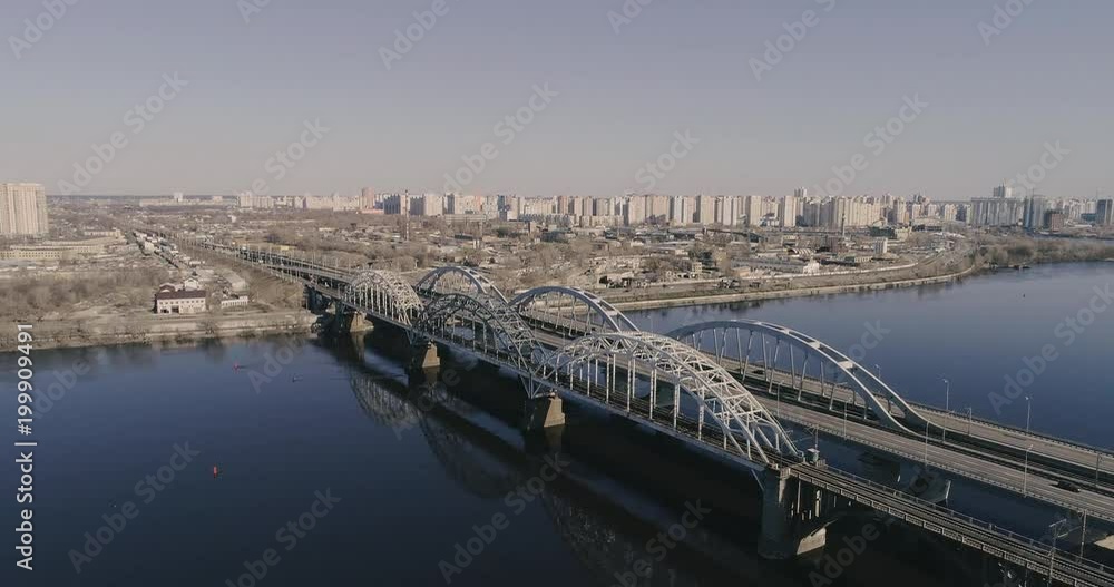 Aerial view of the city traffic on the bridge. Darnitskiy bridge, Kiev, Ukraine Aerial view of the city traffic on the bridge. Darnitskiy bridge, Kiev, Ukraine