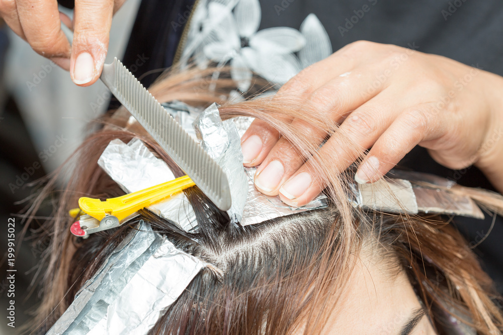 Naklejka premium hair coloring in a beauty salon