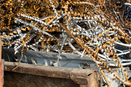 silver spirals of metal shavings as garbage, texture of different size of metal spirals shavings texture, metal shavings texture