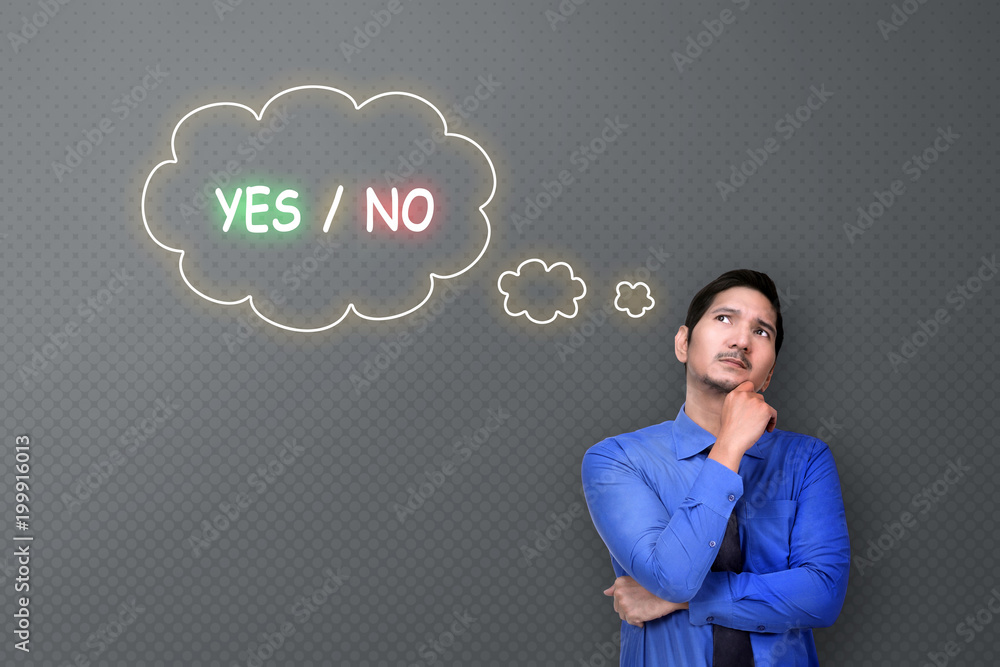 Attractive asian businessman thinking about Yes or No choice Attractive asian businessman thinking about Yes or No choice