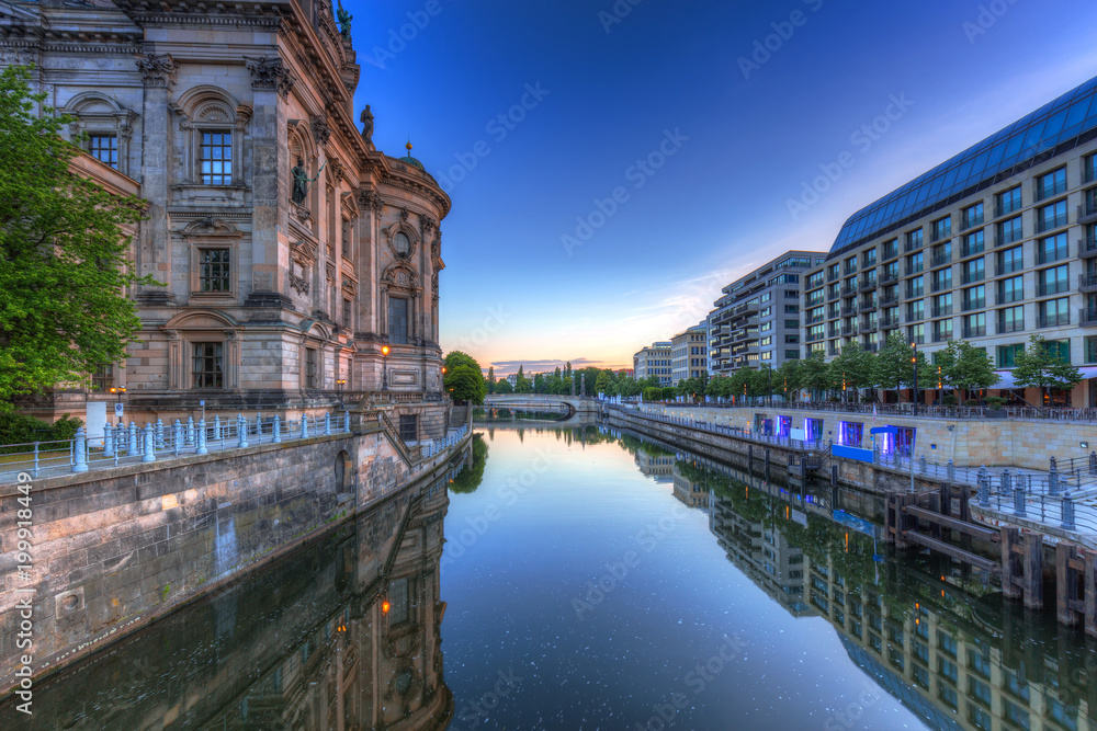 Fototapeta premium Architecture of Berlin reflected in Spree River, Germany