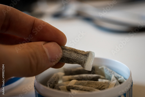 Snus - a box of Snus, a moist powder tobacco product widely consumed in Norway and Sweden and among athletes
