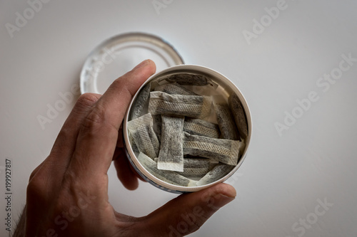 Snus - a box of Snus, a moist powder tobacco product widely consumed in Norway and Sweden and among athletes