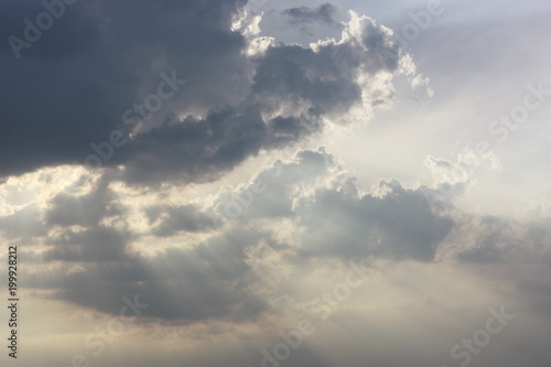 grey clouds and rays of light