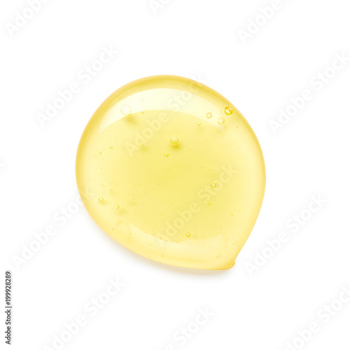 Honey drop isolated on white background