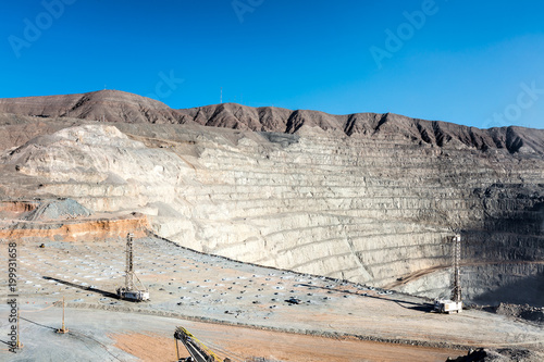 Drilling and Explosive Loading at Open Pit Copper Mine in Northern Chile