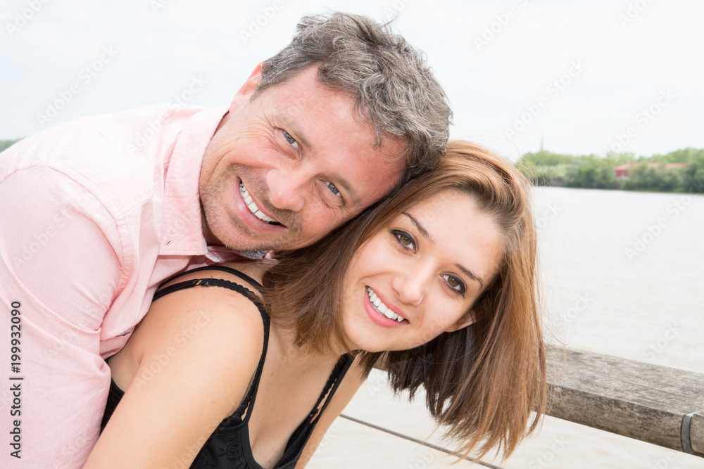 young romantic handsome couple showing one another affection in the city young romantic handsome couple showing one another affection in the city