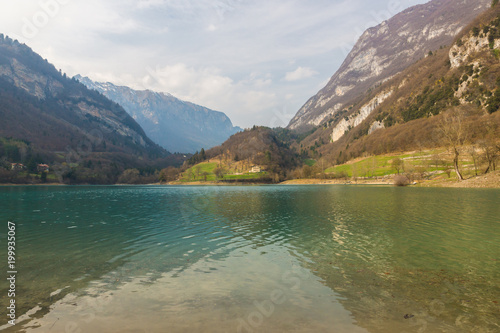 Scenic view on the mountain Tenno lake with calm fresh transparent turquoise blue water  Trentino  Italy  Europe