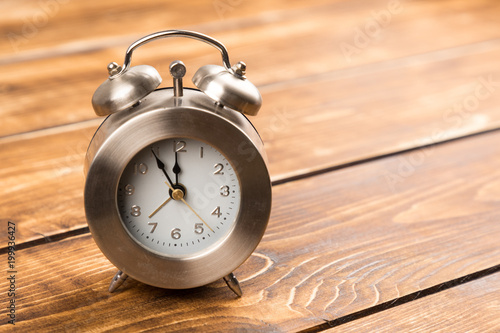 clock on wooden background