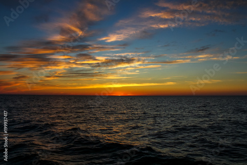 Sunset against the background of water