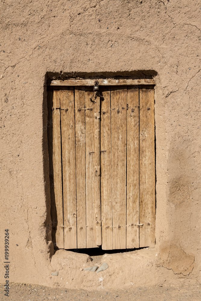 Naklejka premium An Old Door in Khusf, Khorasan, Iran