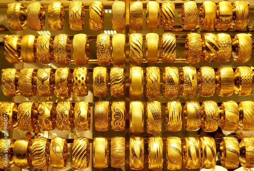 Photography Rows of gold bracelets as a background in a jewelry store on the Grand Bazaar