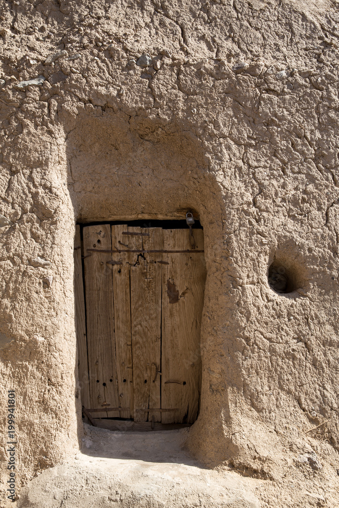 Naklejka premium An Old Door in Khusf, Khorasan, Iran