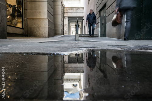 Reflection of a street in a puddle