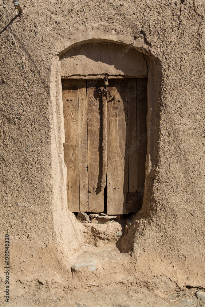Naklejka premium An Old Door in Khusf, Khorasan, Iran