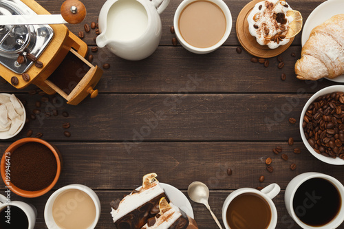 Various coffee cups and sweet pastry on vintage wooden table, to photo