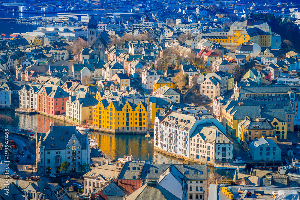 Beautiful outdoor view of colorful buildings from the mountain Aksla at the city of Alesund, Norway