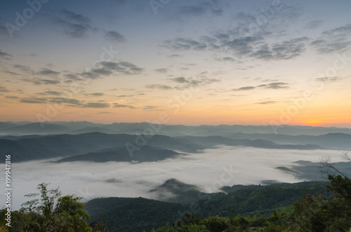 Beautiful clouds and fog among mountain landscape.