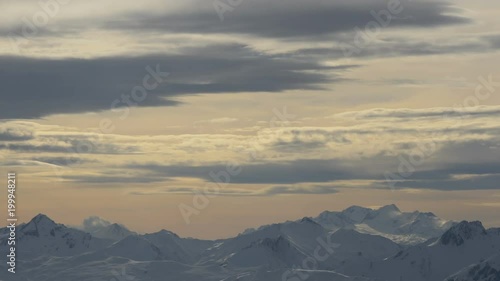 Clouds above mountains photo