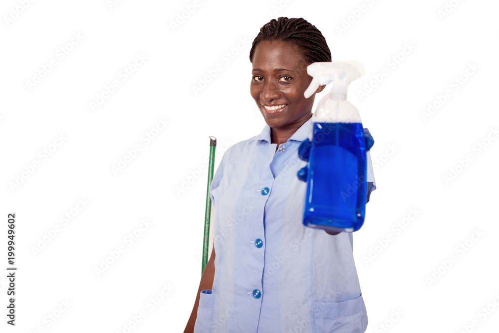 Young smiling woman with a spray bottle cleaning Young smiling woman with a spray bottle cleaning