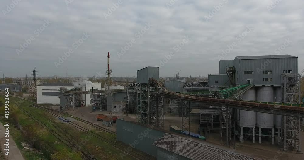 Aerial View of industrial buildings in a river port for dry cargo, Central Europe Aerial View of industrial buildings in a river port for dry cargo, Central Europe