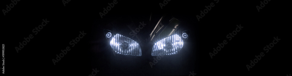 Modern motorcycle headlight with two bulbs