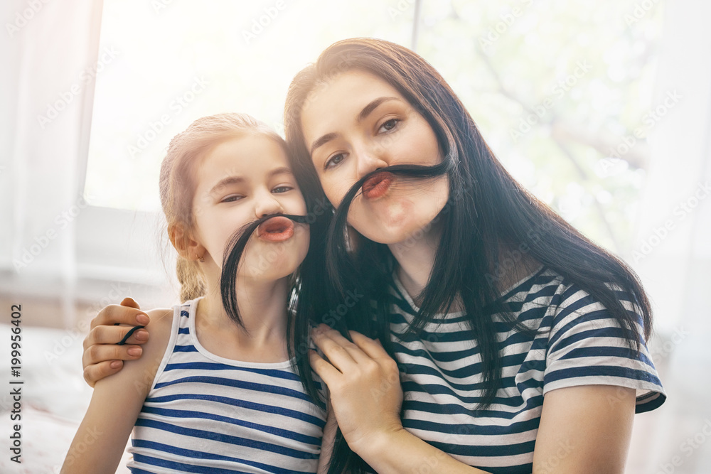 Mom and her daughter are playing Mom and her daughter are playing