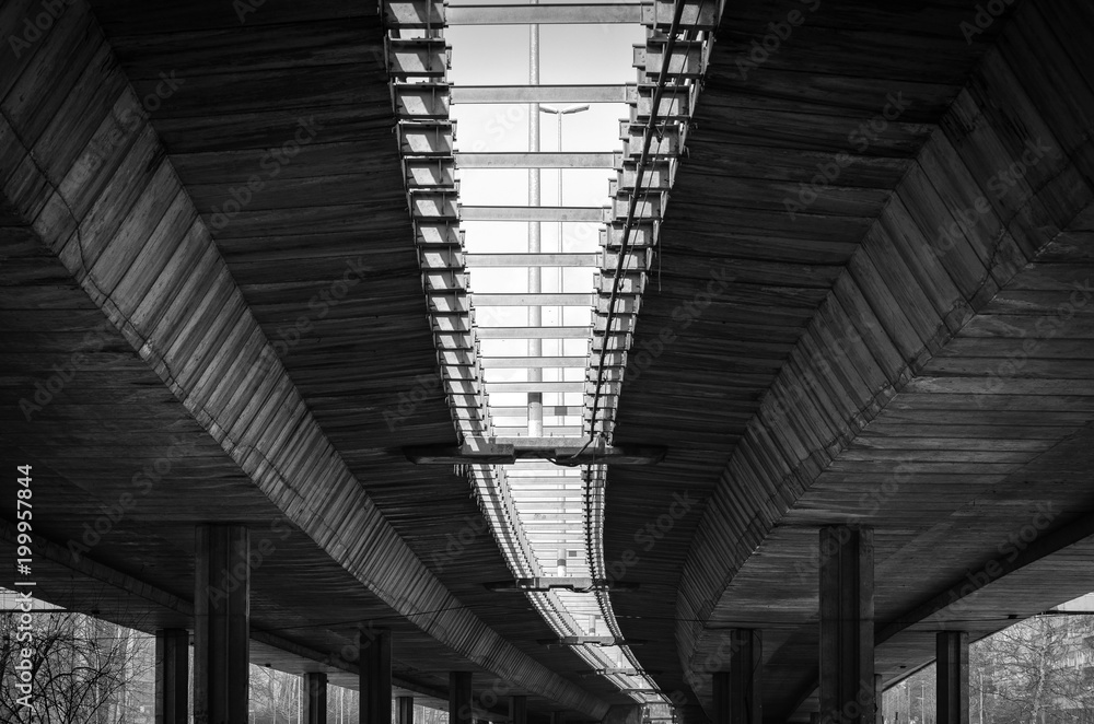 Architecture lines under the bridge with concrete poles and reinforcement black and white